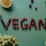 Illustration comparing vegan versus cruelty‑free makeup, highlighting ingredient sources and animal testing policies.